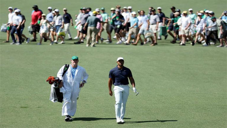 Tiger-mania builds as Woods practices well at Augusta