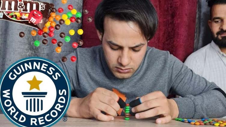 Man Breaks Guinness World Record By Stacking Five M&Ms