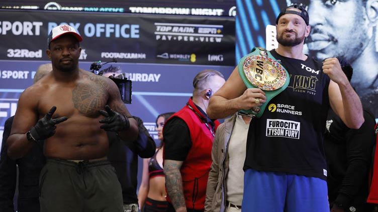 Fury weighs in heavier than contender Whyte ahead of title clash