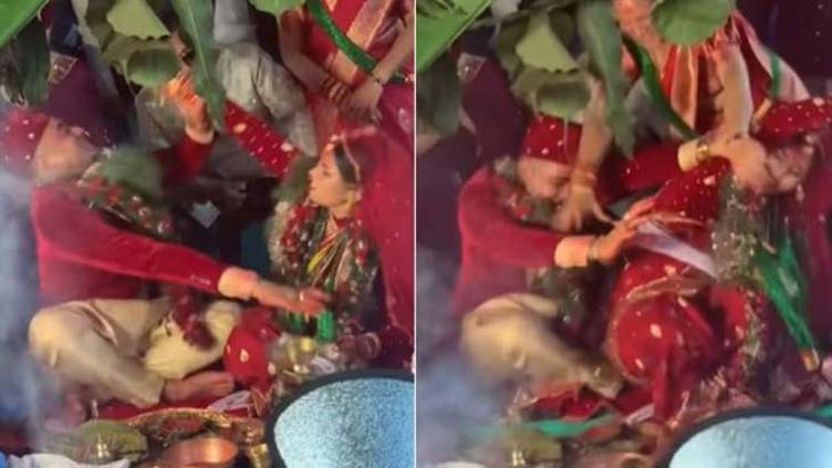 'Enraged' bride beats groom after he refuses to eat from her hand