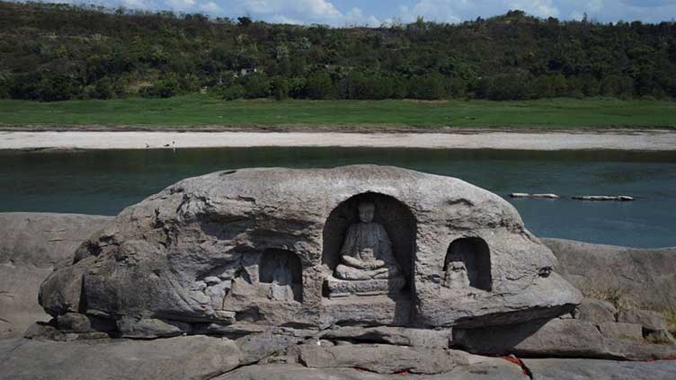 Receding water levels of China's Yangtze reveal ancient Buddhist statues