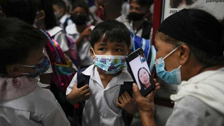 Philippine kids back in school after 2 years lost to virus