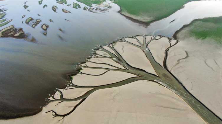  Its largest lake is so dry, China digs deep to water crops