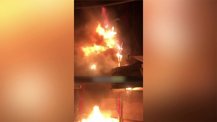 Fire gutted shopping centre in Okara