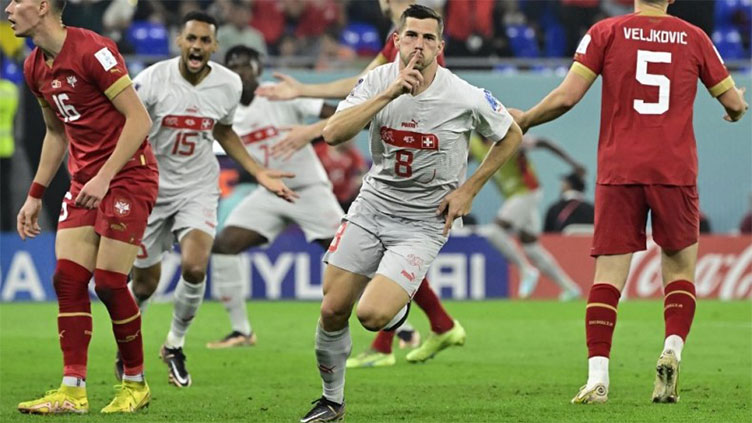 Switzerland edge Serbia in feisty clash to reach World Cup last 16