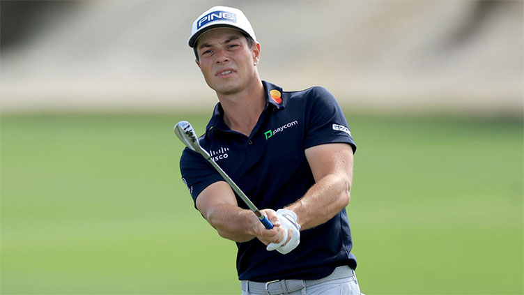 Defending champ Hovland leads wind-whipped Hero World Challenge