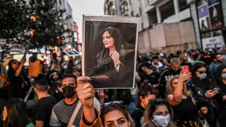  Iran state body reports 200 dead in protests, Raisi hails 'freedoms'