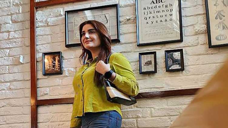'Aliya Ali a real fashionista in neon yellow top'