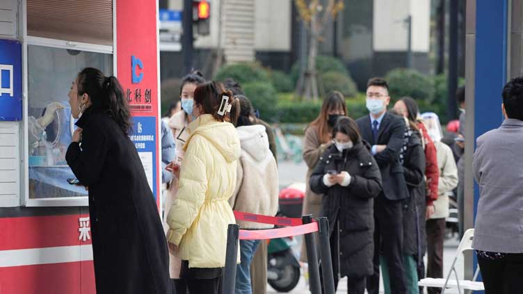  Beijing drops COVID testing burden as wider easing beckons