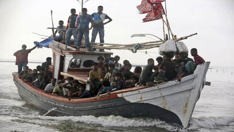 Vietnam vessel saves 154 Rohingya from sinking boat, transfers to Myanmar navy