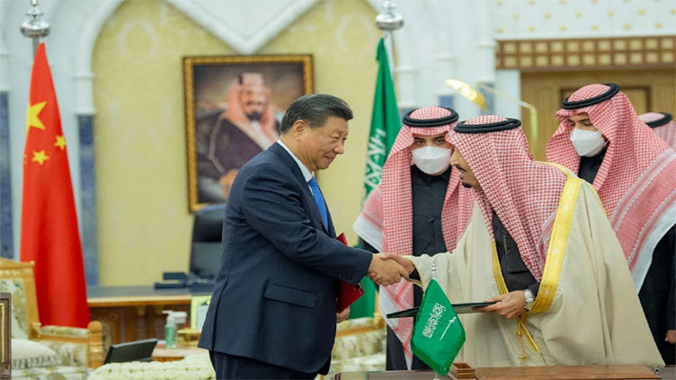 China's Xi promotes Mideast security, energy ties at Saudi summits