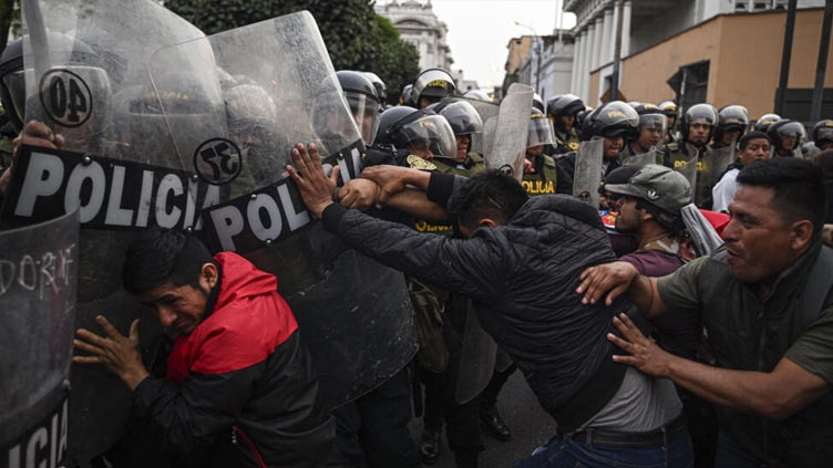 Lima's streets tense as Peru leader hints at early elections