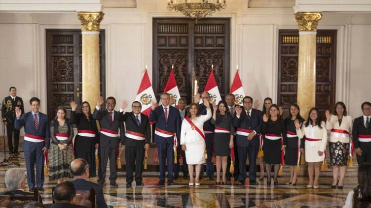 Amid protests, Peru's new leader swears in cabinet