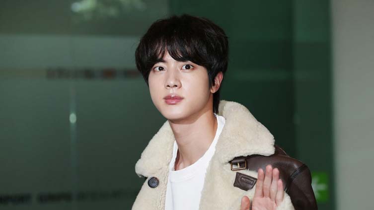 BTS star Jin begins South Korea army duty amid tight security, cheering fans