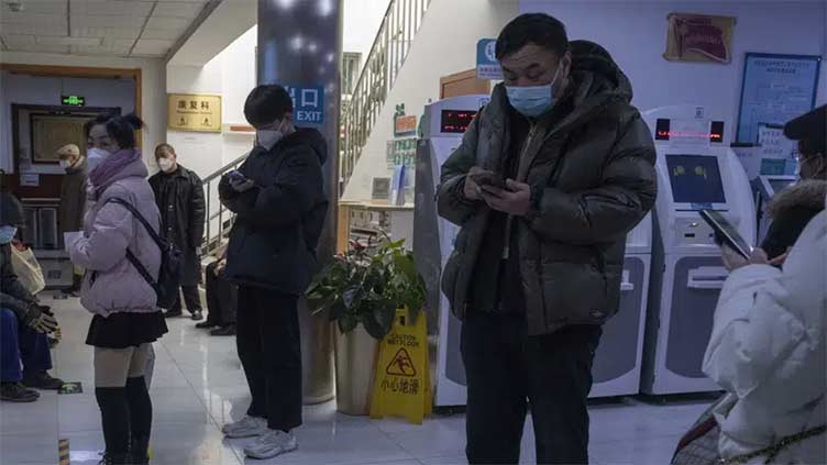 A week into China's easing, uncertainty over virus direction