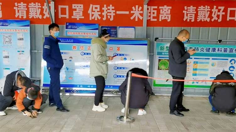 'Go all out': China prepares for infection spread after Covid policy U-turn