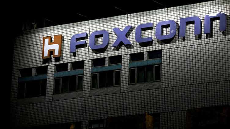 Foxconn unit to sell stake in Chinese chip firm Unigroup