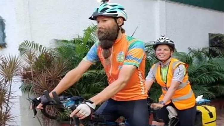 British couple travels globe on bike in 180 days