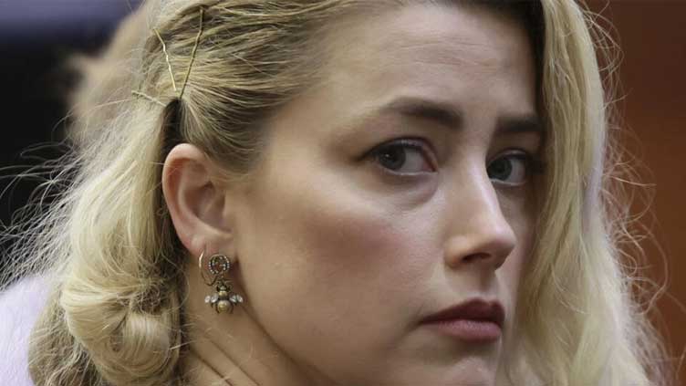 Amber Heard settles defamation case with ex Johnny Depp