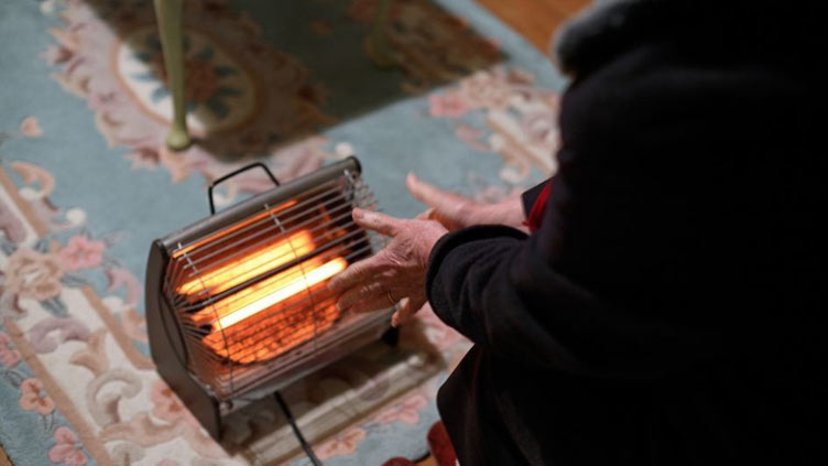 Struggling to afford heating bills, Britons turn to 'warm banks' to keep out the cold