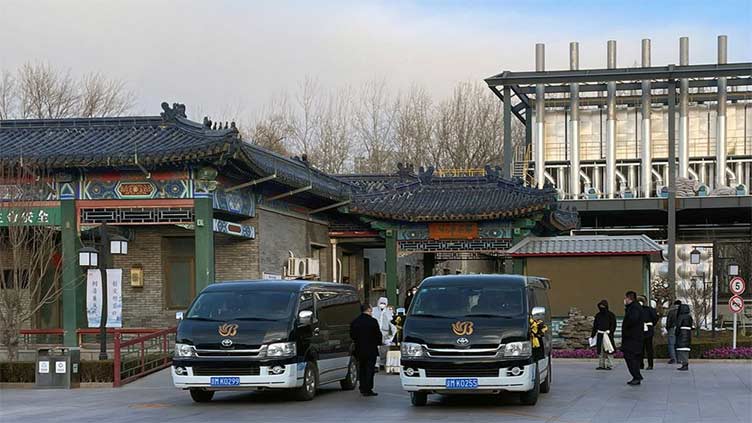 Long waits, high fees for cremation services in Beijing as Covid cases surge