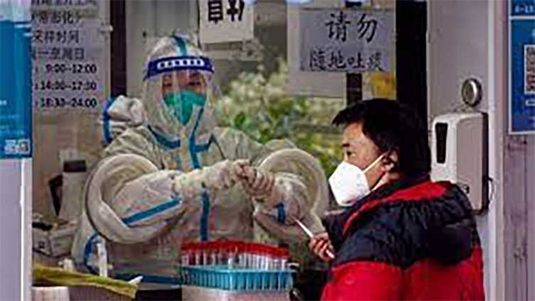 CHINA SAYS NO NEW COVID DEATHS AFTER CHANGING CRITERIA