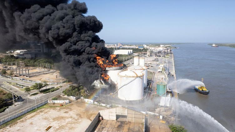 Oil tank in Colombia's Barranquilla explodes into flames, one dead