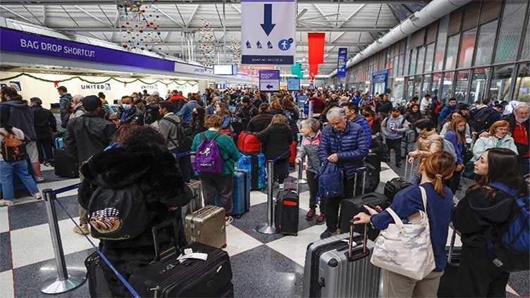 Holiday flights scrapped as massive winter storm sweeps US