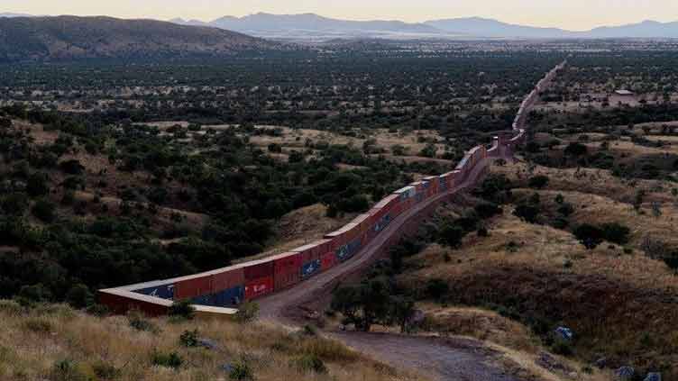 Arizona to remove makeshift border wall after federal lawsuit