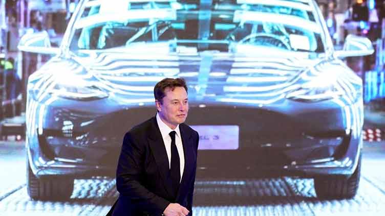 Elon Musk says he will not sell more Tesla stock for about two years