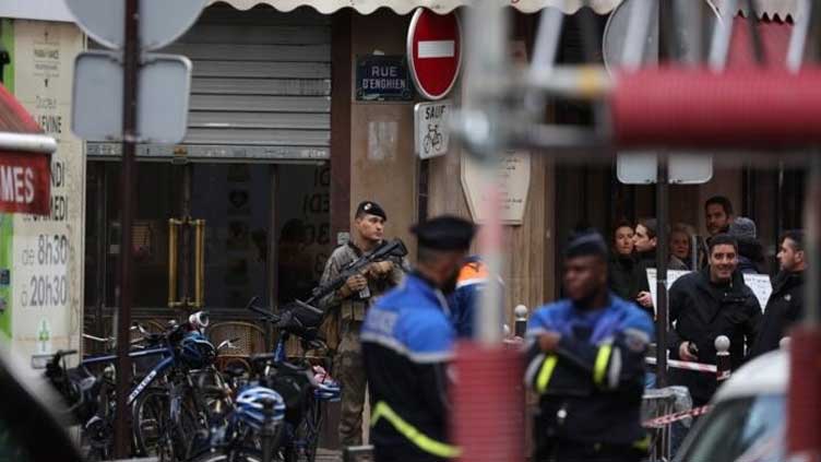 Paris shooting kills two, wounds four: prosecutor 