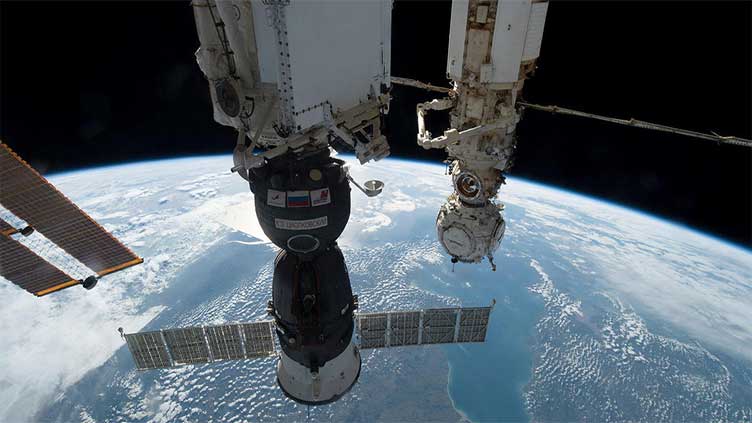 Russia mulls early return of space station crew after Soyuz capsule leak