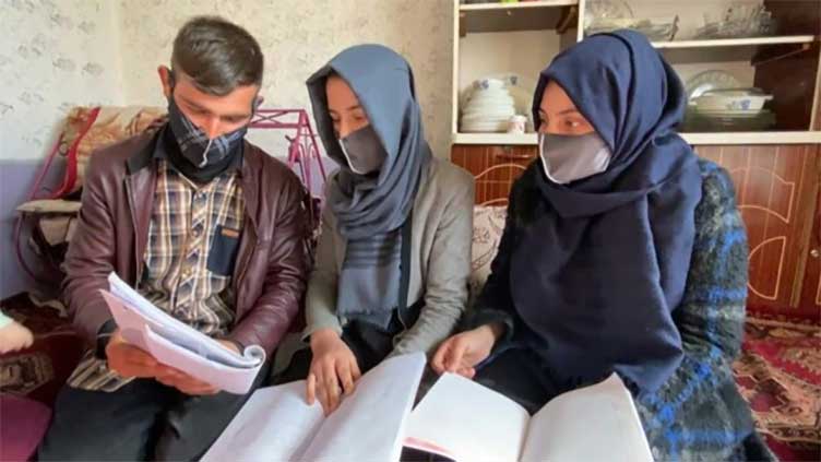 Brother and sister's future separated after Taliban university ban