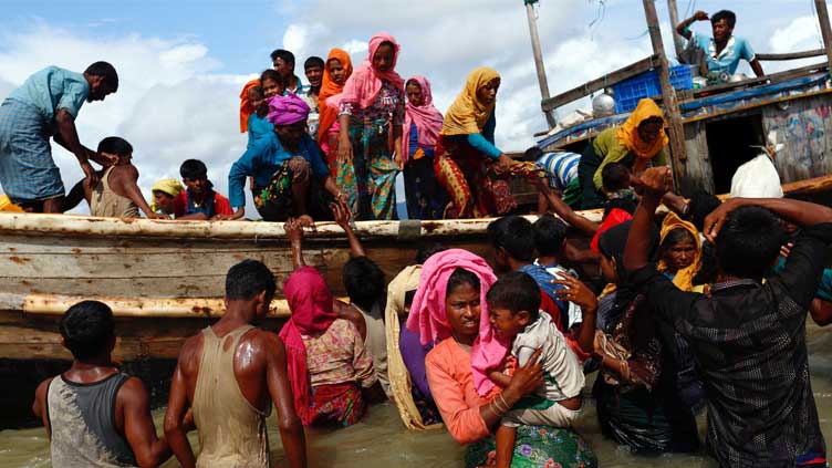 Hundreds of Rohingya people leave Bangladesh in rickety boats