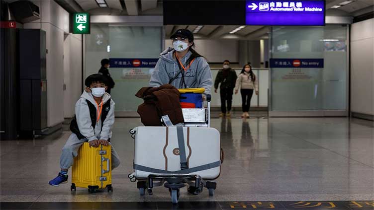 Hong Kong to scrap Covid tests for arrivals, vaccine pass - media