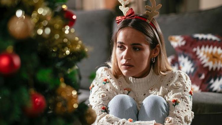 Woman made to sit on the floor all Christmas Day