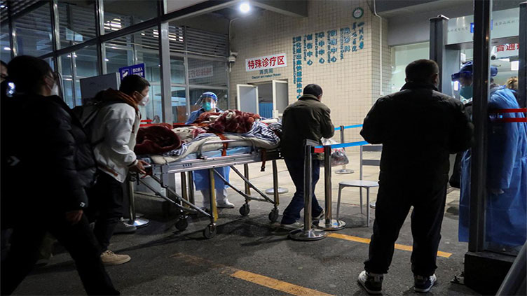 COVID pressures China's hospitals as countries mandate tests for