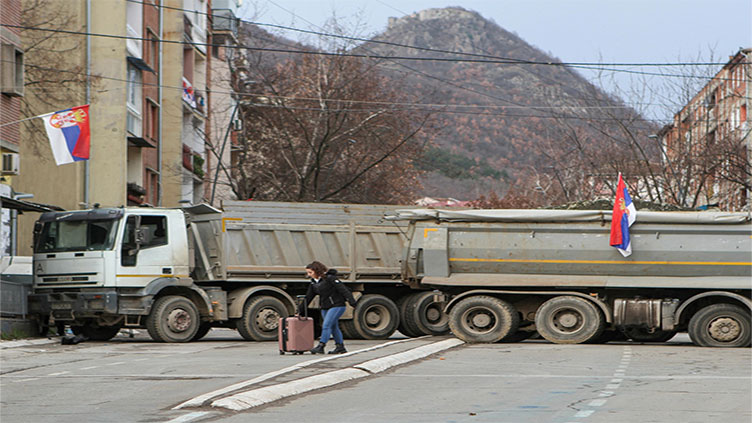 Serbs in northern Kosovo agree to start removing barricades