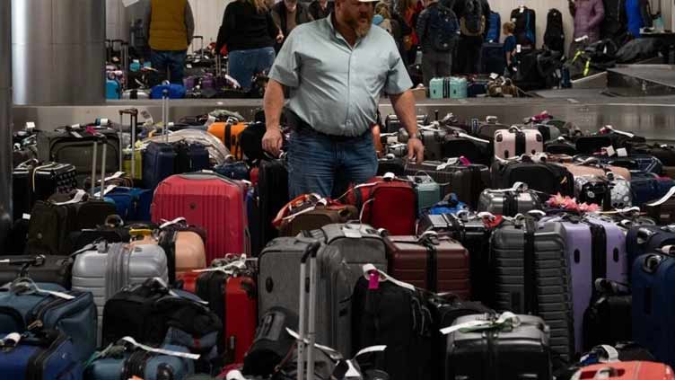 Travel misery grinds on as US digs out from superstorm