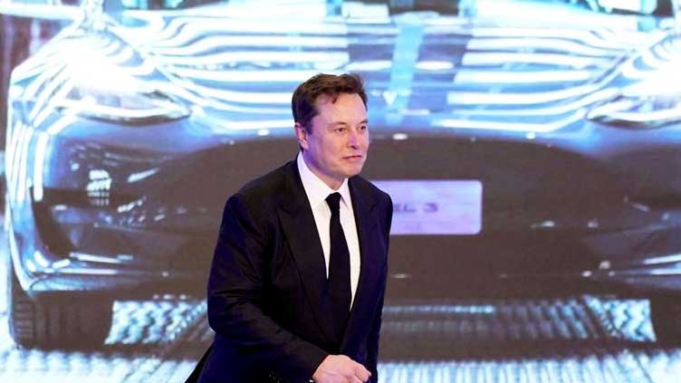  Musk tells Tesla workers not to be 'bothered by stock market craziness'
