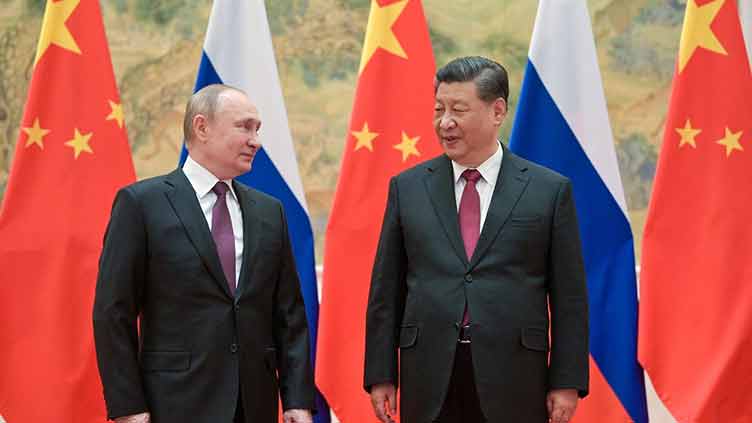 Putin hails 'unprecedented' close ties with China in Xi meeting