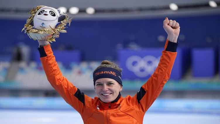 Wust skates into history with another golden Olympic moment