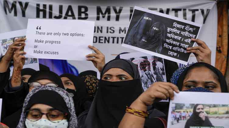 India court: No religious clothes until hijab row settled