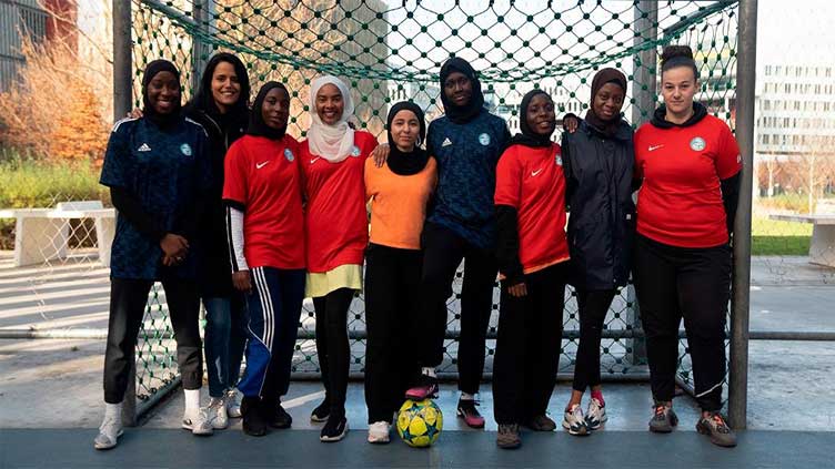 French minister condemns headscarf ban for Muslim footballers