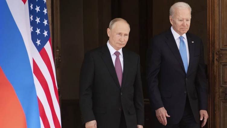 Biden warns Putin of 'severe costs' of Ukraine invasion