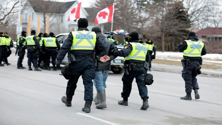 Canada police clear key border bridge but protests still crippling Ottawa