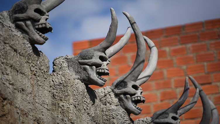 Bolivian house with devil sculptures spooks highland city