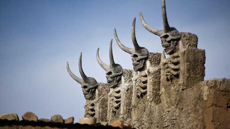 Bolivian house with devil sculptures spooks highland city