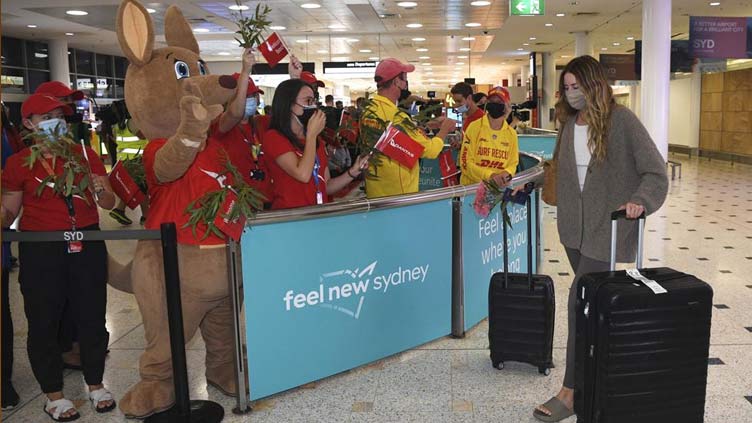 Australia welcomes back tourists with toy koalas, Tim Tams