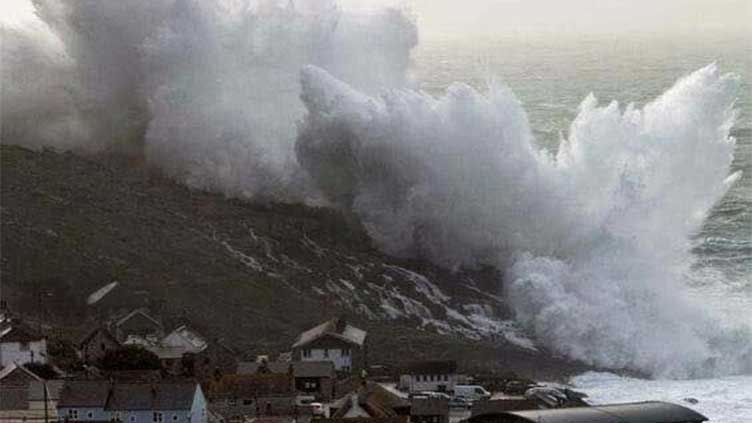 Photograph of waves crashing ashore near village wasn't taken during Storm Eunice in Feb 2022